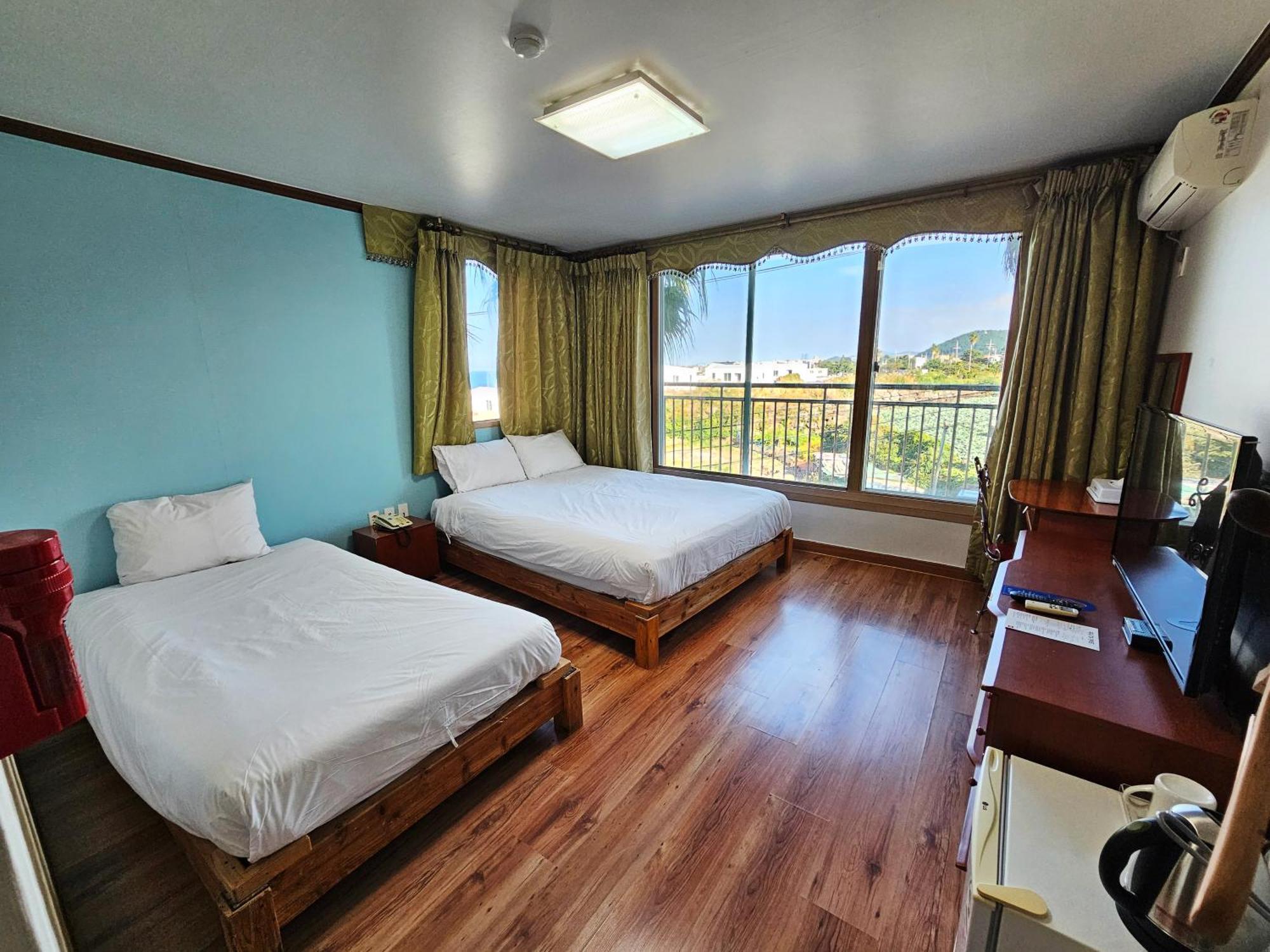 Sea Cliff Hotel Чечжу Номер фото